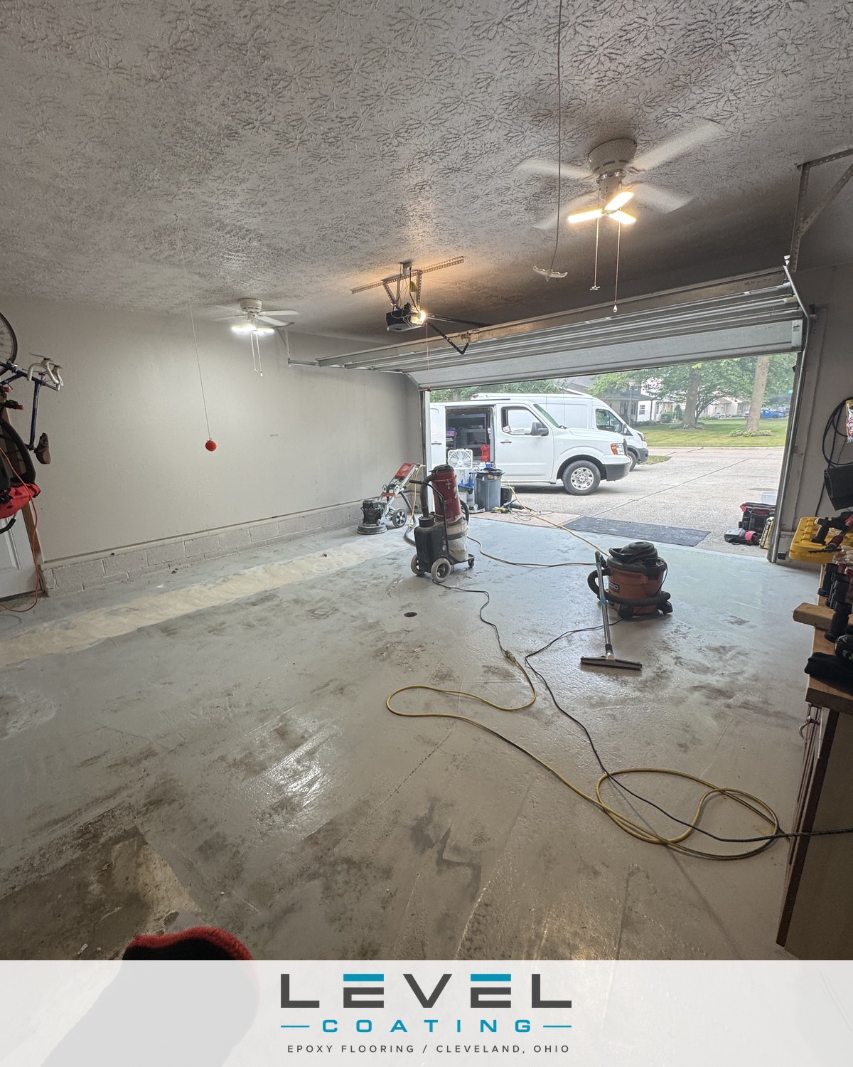 Garage concrete being diamond ground before coating - Broadview Heights, OH